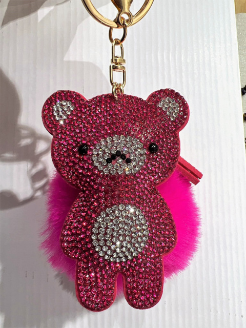 Decorative keychains for keys, purses with pom-poms