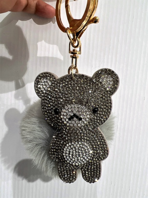 Decorative keychains for keys, purses with pom-poms