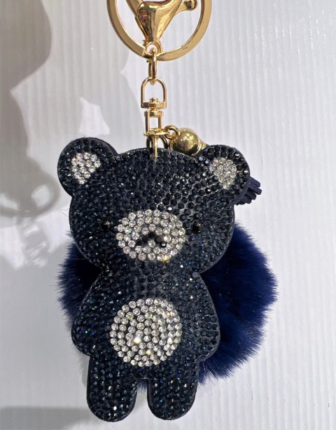 Decorative keychains for keys, purses with pom-poms
