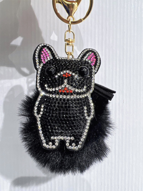 Decorative keychains for keys, purses with pom-poms