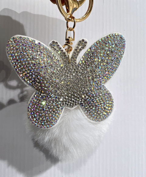 Decorative keychains for keys, purses with pom-poms