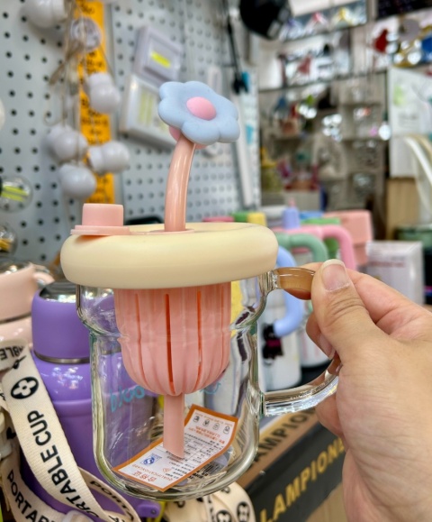 Cup with a straw